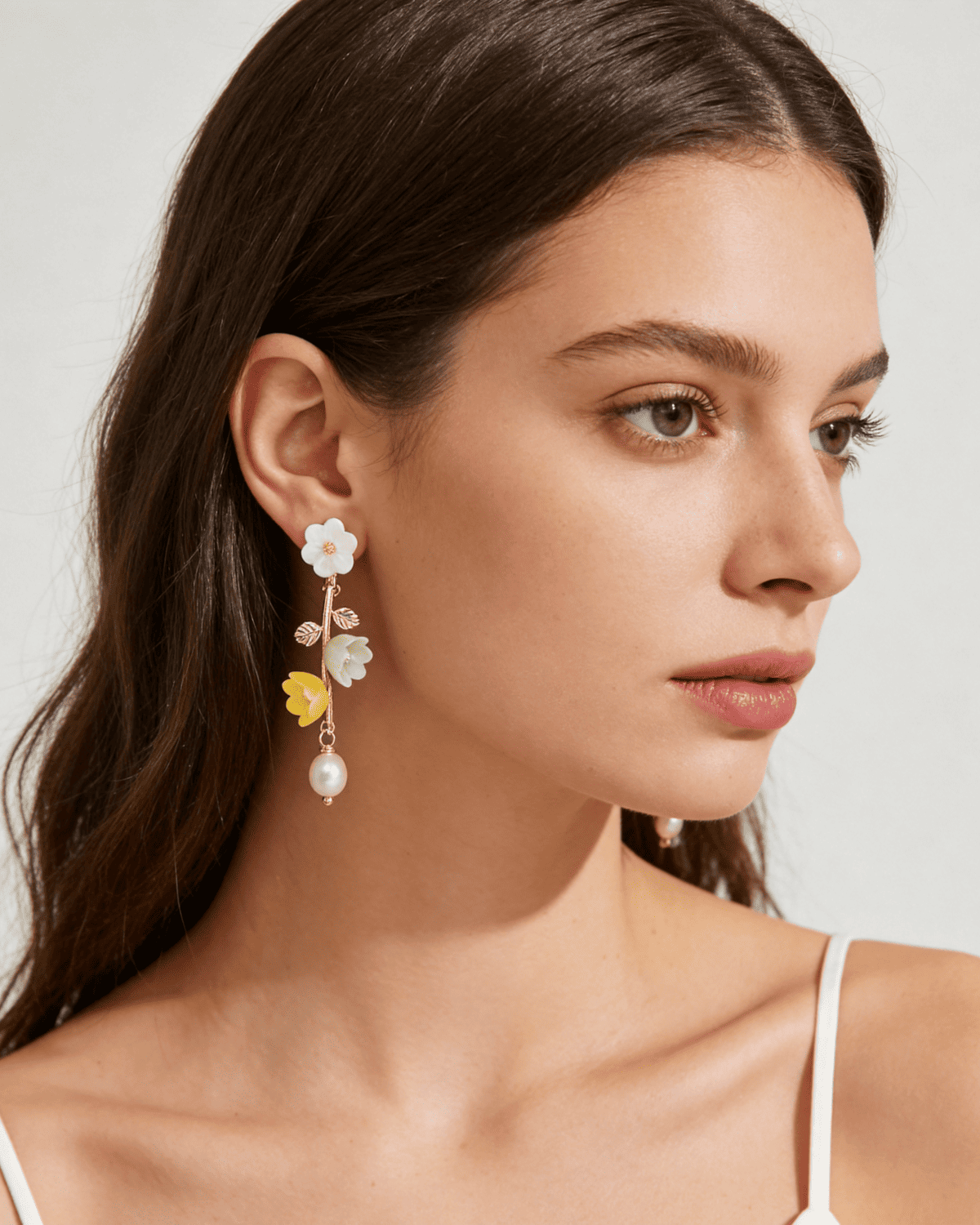 ZELIN ART porcelain jewelry worn in vertical editorial portrait